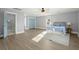 Spacious main bedroom featuring a light blue color scheme and hardwood floors at 282 Great Lawn Dr, Summerville, SC 29486