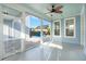 Screened in porch with ceiling fan, backyard views, and access to the pool at 282 Great Lawn Dr, Summerville, SC 29486