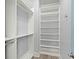 Well-organized walk-in closet with shelving and hanging rods, maximizing storage space at 282 Great Lawn Dr, Summerville, SC 29486