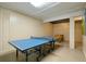 Spacious basement with a ping pong table and foosball table; perfect for recreation and entertainment at 3 37Th Ave, Isle of Palms, SC 29451