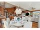 Beautiful dining room featuring an elegant chandelier and a seating area with wood paneling at 3 37Th Ave, Isle of Palms, SC 29451