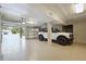 Spacious garage featuring epoxy floors, an automatic door, and room for parking and storage at 3 37Th Ave, Isle of Palms, SC 29451
