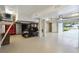Clean garage with epoxy floor, golf cart, tool chest, storage units, and open layout at 3 37Th Ave, Isle of Palms, SC 29451