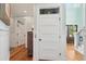 Hallway boasting hardwood floors, an elevator, neutral paint, and trim at 3 37Th Ave, Isle of Palms, SC 29451