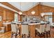 Bright kitchen with bar seating, modern appliances, marble countertops, and open floor plan at 3 37Th Ave, Isle of Palms, SC 29451