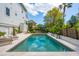 A beautiful in-ground pool offers a refreshing escape within a private backyard oasis at 3 37Th Ave, Isle of Palms, SC 29451