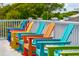 Charming rooftop deck with an array of colorful Adirondack chairs at 3 37Th Ave, Isle of Palms, SC 29451