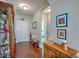 Inviting foyer with hardwood floors, soft gray walls, decorative furnishings and access to other rooms in the home at 301 Blakely Village Ln, Summerville, SC 29486