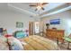 Spacious main bedroom featuring a ceiling fan and neutral tones at 301 Blakely Village Ln, Summerville, SC 29486