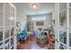 Home office featuring hardwood floors, natural light, and colorful decor at 301 Blakely Village Ln, Summerville, SC 29486