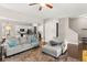 Open-concept living area featuring stylish furnishings and seamless flow to the kitchen at 308 Scholar Way, Summerville, SC 29486