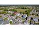 Picturesque neighborhood with colorful houses and well-maintained lawns and garages at 311 Amaryllis Ave, Summerville, SC 29483