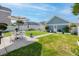 Backyard with lush grass, and a concrete patio, perfect for outdoor gatherings at 311 Amaryllis Ave, Summerville, SC 29483