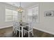 Dining room featuring lots of windows, a chandelier, and table with six chairs at 311 Amaryllis Ave, Summerville, SC 29483