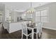 Lovely kitchen showcases stainless steel appliances, granite countertops and adjacent dining area at 311 Amaryllis Ave, Summerville, SC 29483
