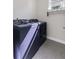 Modern laundry room featuring front-load washer and dryer at 311 Amaryllis Ave, Summerville, SC 29483