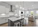 Bright and modern kitchen with an island, pendant lighting, and stainless steel appliances at 3130 Sturbridge Rd, Mount Pleasant, SC 29466