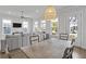 Bright and airy living room featuring a stylish light fixture at 3130 Sturbridge Rd, Mount Pleasant, SC 29466