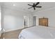 A sunlit main bedroom provides doorways to both an ensuite bathroom and a walk-in closet at 3130 Sturbridge Rd, Mount Pleasant, SC 29466
