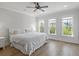 A spacious main bedroom is brightened by natural light from three large windows at 3130 Sturbridge Rd, Mount Pleasant, SC 29466