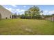 Beautiful backyard with healthy lawn, mature trees, providing a serene outdoor setting at 3154 Hugh Bennett Dr, Johns Island, SC 29455
