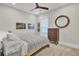 Comfortable bedroom with ceiling fan, natural light and neutral decor at 3154 Hugh Bennett Dr, Johns Island, SC 29455