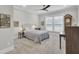 Spacious bedroom features neutral decor, ceiling fan, carpet, and natural light at 3154 Hugh Bennett Dr, Johns Island, SC 29455