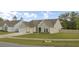 Charming home with a well-manicured lawn and a two-car garage at 3154 Hugh Bennett Dr, Johns Island, SC 29455