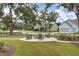 Gather around the inviting fire pit with Adirondack chairs for cozy outdoor evenings at 3154 Hugh Bennett Dr, Johns Island, SC 29455