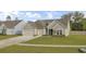Beautifully landscaped single-Gathering home with a two-car garage and a well-maintained lawn at 3154 Hugh Bennett Dr, Johns Island, SC 29455