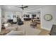 Open-concept living area featuring a cozy living room, modern kitchen, and stylish finishes at 3154 Hugh Bennett Dr, Johns Island, SC 29455