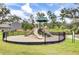 A safe playground with slides, climbing, and surrounded by a fence for added security at 3154 Hugh Bennett Dr, Johns Island, SC 29455
