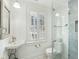 Modern bathroom with stylish vanity, toilet, and sleek glass shower at 32 Church St, Charleston, SC 29401