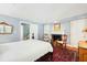 Cozy bedroom featuring fireplace and antique decor at 32 Church St, Charleston, SC 29401