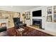 Inviting living room with fireplace, built-ins, and comfortable seating area at 32 Church St, Charleston, SC 29401