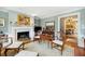 Cozy living room featuring a marble fireplace and blue walls at 32 Church St, Charleston, SC 29401