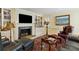 Cozy living room features a fireplace, built-in bookshelves, and comfortable seating at 32 Church St, Charleston, SC 29401