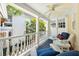 Inviting porch featuring outdoor furniture and view at 32 Church St, Charleston, SC 29401