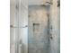 Modern shower with stylish fixtures and subway tile at 32 Church St, Charleston, SC 29401