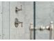 Close up of the shower with chrome shower head and stylish marble tile design at 32 Church St, Charleston, SC 29401