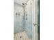 Elegant shower featuring stylish fixtures and subway tile at 32 Church St, Charleston, SC 29401