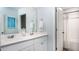 Bright bathroom features a double vanity with a large mirror and plenty of storage at 325 Pine Crest View, Summerville, SC 29486