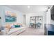 Cozy living room with a comfortable sofa, desk, shelving, and artwork, creating a relaxed and functional space at 325 Pine Crest View, Summerville, SC 29486
