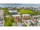 An aerial view of a building highlighting its proximity to the park, parking, and views of the bay at 33 Calhoun St # 123, Charleston, SC 29401