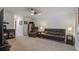 Cozy basement with plush carpeting, featuring a leather sofa, recliner, and entertainment center at 349 Long Pier St, Summerville, SC 29486
