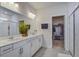 Elegant bathroom features double vanity, large mirror, walk-in closet, and a glass-enclosed shower for a spa-like feel at 349 Long Pier St, Summerville, SC 29486