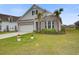 Charming single-Gathering home with a well-manicured lawn, complemented by tasteful landscaping and a brick facade at 349 Long Pier St, Summerville, SC 29486