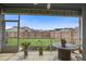 Relaxing screened porch with peaceful views of the fenced backyard and neighborhood at 349 Long Pier St, Summerville, SC 29486