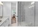 Stylish bathroom with a patterned glass shower enclosure and elegant fixtures, creating a spa-like atmosphere at 4 Addison St, Charleston, SC 29403