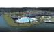 Aerial view of community pool, clubhouse and lake at 440 Four Seasons Blvd, Summerville, SC 29486